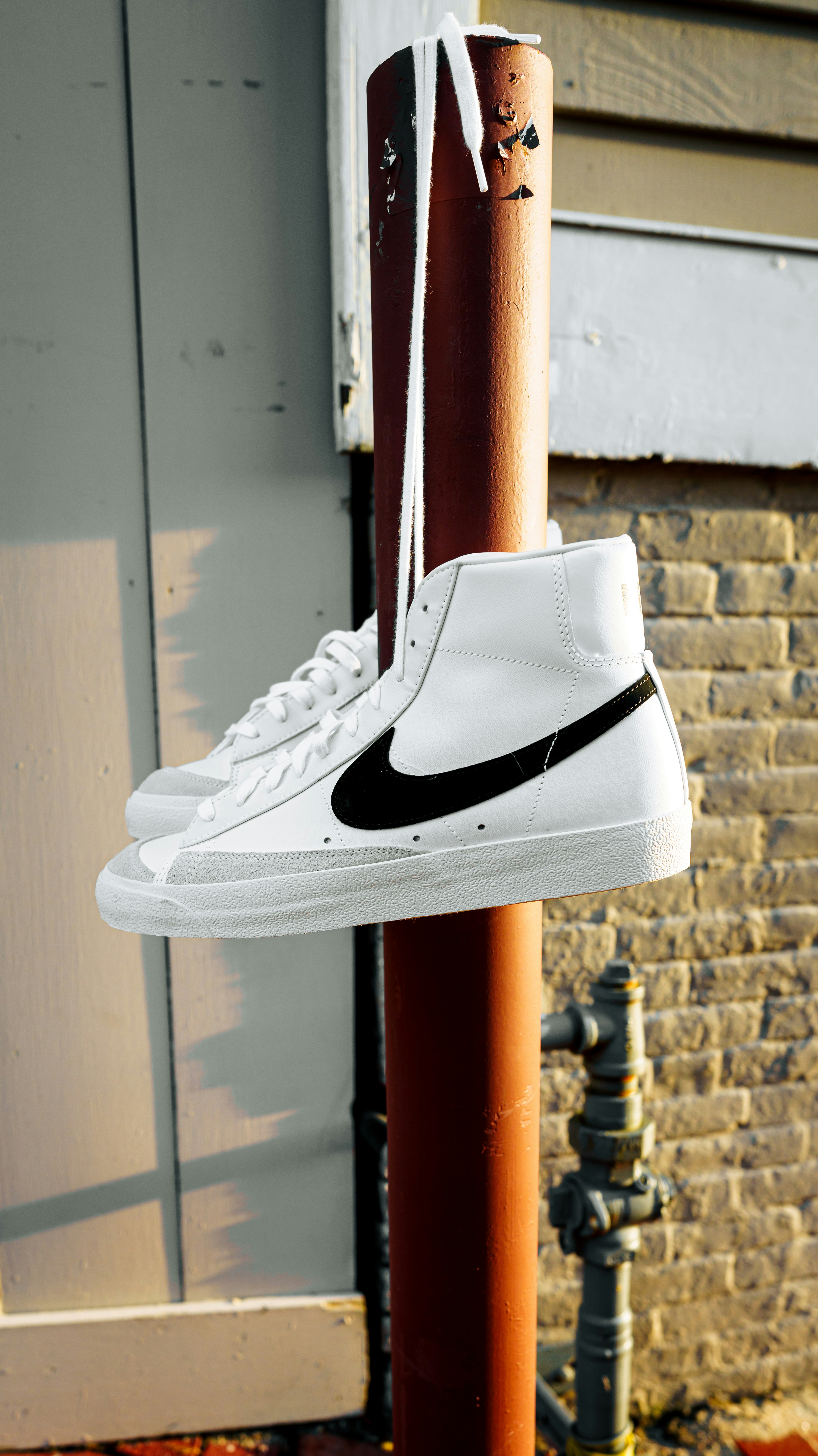 white and black nike sneaker